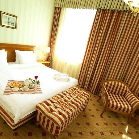 Grand Tien Shan Hotel Almaty Chambre photo